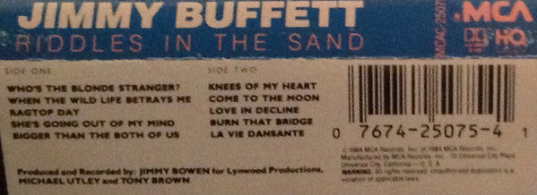 Jimmy Buffett : Riddles In The Sand (Cass, Album, Hig)