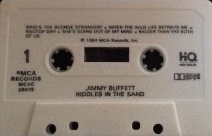 Jimmy Buffett : Riddles In The Sand (Cass, Album, Hig)
