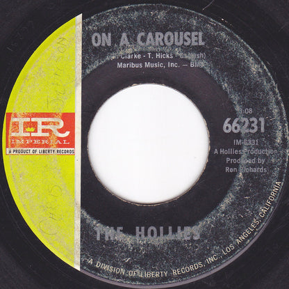 The Hollies : On A Carousel (7", Single, Mono, Rai)