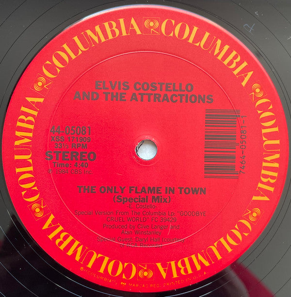 Elvis Costello & The Attractions : The Only Flame In Town (12", Single, Pit)