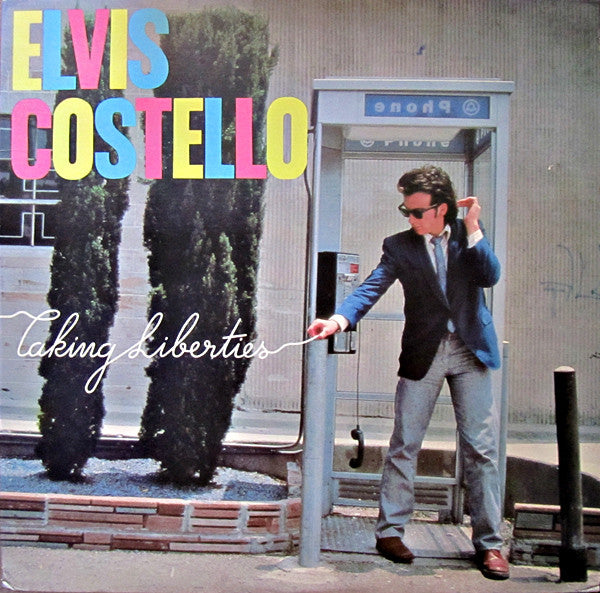 Elvis Costello : Taking Liberties (LP, Comp, San)