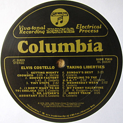 Elvis Costello : Taking Liberties (LP, Comp, San)